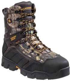 a pair of boots with yellow laces on the outstep and camouflage print