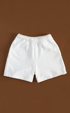 Cozy and consciously made, our 100% Organic Traceable Cotton Sweatshorts are the perfect intersection of sustainability and street style. LEARN MORE → certified organic fibre→ free from toxic substances like bleach & formaldehyde→ colored with nontoxic dyes→ water and energy are monitored→ manufactured in safe working conditions MeasurementsSizes: XS, S, M, L, XL, XXLColor: Off-white SIZE CHART Basic Relaxed Fit Shorts, Basic White Bottoms With Built-in Shorts, Relaxed Fit White Bottoms With Built-in Shorts, Basic Cotton Shorts, White Solid Color Shorts For Spring, White Cotton Athletic Shorts With Built-in Shorts, White Cotton Athletic Shorts With Elastic Waistband, Basic Solid Short Bottoms, Casual Solid Biker Shorts With Pockets