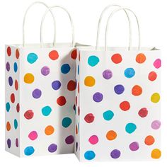 two white bags with multicolored polka dots on them