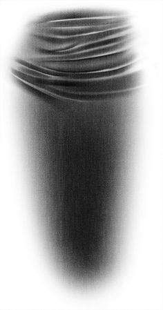 a black and white photo of water in a cup with liquid swirling around the edges