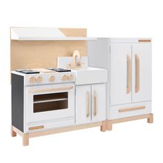 a wooden play kitchen with white appliances and wood accents on the doors, drawers, and cupboards