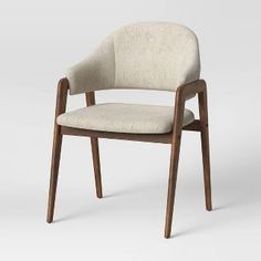 an upholstered chair with a wooden frame and fabric seat, viewed from the front