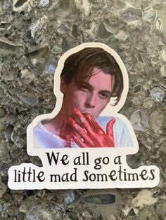 a sticker that says we all go a little mad sometimes