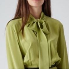 Beautiful Silk Blouse From Gucci Missing A Button This Is The Employee Shirt. Longsleeve With Buttons Down Center Front And A Long Silk Bow Tie. Very Soft. Great Authentic Designer Quality 1881-25 Gucci Tops For Work With Button Closure, Gucci Collared Tops For Work, Elegant Green Top For Workwear, Elegant Green Tops For Workwear, Elegant Green Top For Work, Gucci Collared Blouse For Formal Occasions, Gucci Fitted Tops For Spring, Designer Button-up Blouse For Office, Fitted Gucci Tops For Spring