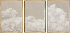 three framed pictures with clouds in the sky