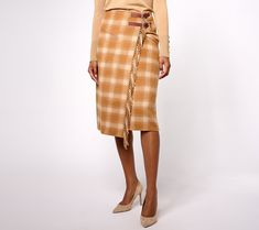 A wearable blanket? Yes, please! This plaid skirt gives you all the warm and cozy feels with a fringe trim and decorative double-belt closure that secures at the waist. Team it with a turtleneck sweater and suede ankle boots for a wow-worthy look. From Denim & Co.® Fashions. Beige Pleated Skirt For Fall, Blanket Skirt, Skirt With Fringe, Denim Button Skirt, Long Jean Skirt, Black Velvet Skirt, Double Belt, High Waisted Denim Skirt, Denim Midi Dress