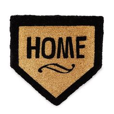 a door mat with the word home on it and a baseball bat in the center