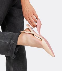 The everyday heel is a sophisticated style you can wear from desk to dinner. It was designed to be effortless, minimal and simplistic. The everyday heel features a bucklenback strap and is adorned with the 'VICE VERSA' signature split between the two shoes.