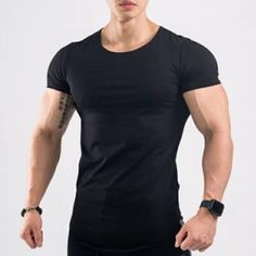 Sportswear Stretch Muscle Tee With Crew Neck, Crew Neck Stretch Muscle Tee For Sportswear, Stretch Muscle Tee With Crew Neck In Sportswear Style, Stretch Crew Neck Muscle Tee For Sportswear, Stretch Muscle Tee With Crew Neck For Sportswear, Basic Crew Neck Gym Tops, Stretch Muscle Tee With Crew Neck For Gym, Solid Color Muscle Tee For Sports With Crew Neck, Fitted Black Muscle Tee With Crew Neck