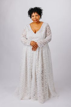 The Rue Gown is perfect for the boho bride. This gown features: V neckline and back made from soft boho-inspired lace, lined with matte satin with supportive boning Flowy, gathered skirt made from soft boho-inspired lace, lined with a matte satin a-line circle skirt Optional fitted sleeves or bishop sleeves with elastic cuffs, available as detachable or permanently attached sleeves Optional small train Center back zipper closure or optional corset back Customize this dress to make it yours by ch V-neck Gown With Lace Bodice, Lace Gown With Fitted Bodice And V-neck, Fitted Lace Maxi Dress With Lace Back, Delicate Lace Maxi Length Gown, Lace Maxi Dress With Lace Back For Wedding, Floor-length Lace Wedding Dress With Lace Bodice, Wedding Maxi Dress With Lace Back, V-neck Delicate Lace Maxi Dress For Wedding, Lace Bridal Gown With Lace Bodice