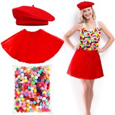 a woman standing next to a pile of colorful candies and a red turban