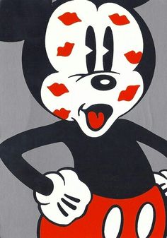 an image of mickey mouse painted on the side of a building in red and black