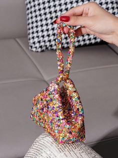 This stunning handbag is a must-have for any stylish woman looking to make a statement at parties. The shimmering gemstone glitter adds a touch of luxury and the perfect amount of sparkle. With this ultimate party accessory, you'll be the center of attention and exude confidence with every step. Color : Multicolor Details : Rhinestone Magnetic : Yes Pattern Type : Geometric, All Over Print Bag Size : Mini Style : Glamorous Closure Type : Magnet Strap Type : Top Handle Type : Novelty Bag Material Glitter Handbag, Glitter Clutch Bag, Braided Bag, Glitter Clutch, Exude Confidence, Clutches For Women, Sparkle Wedding, Novelty Bags, Woman Looking