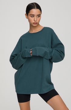 Let yourself lounge in the soft comfort of this oversized long-sleeve T-shirt with slouchy dropped shoulders and cut from breathable cotton. Crewneck Long sleeves 100% cotton Machine wash, tumble dry Imported Women's Clothing Black Owned and Founded Clothing Black, Extra Long Sleeves, Good American, Cotton Knit, Jeans Shop, Extra Long, Long Sleeve Tshirt Men, Long Sleeve Tshirt, Active Wear