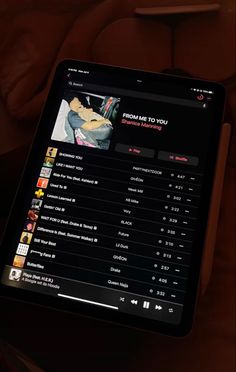 an image of a tablet with music playing on it