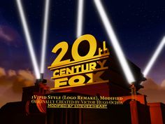 the 20th century fox logo is lit up at night with bright beams in the sky