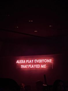 a neon sign that says alexka play everyone that played me