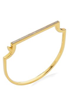 Designed with a dynamic mix of geometric lines and flowing curves, this glistening bangle features a flattened edge alight with pavé diamonds. The striking piece is fastened with a hardware-inspired hinge closure. Style Name:Monica Vinader Signature Skinny Diamond Bangle. Style Number: 6238036. Modern Diamond Bracelet With Pave Setting, Modern Gold Bangle With Pave Setting, Modern Diamond Bracelet With Single Cut Diamonds, Modern Diamond Bangle Bracelet, Modern Single Cut Diamond Cuff Bracelet, Monica Vinader, Diamond Bangle, Geometric Lines, Pave Diamonds