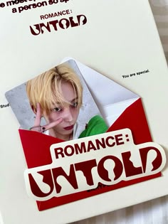 an envelope with a sticker on it that says romance unto