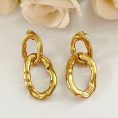 These beautiful pierced earrings are vintage from the 1980s. Gorgeous 14k gold plated statement dangly circle earrings. Length: 3.7cm. Width: 1.8cm. www.vintageamara.co.uk Tarnish Resistant Yellow Gold Circle Earrings, Gold-plated Drop Clip-on Earrings, Nickel-free Gold-plated Circular Earrings, Nickel-free Gold Plated Circular Earrings, Gold Metal Clip-on Earrings For Anniversary, Nickel Free Gold Plated Circle Earrings, Gold Circle Clip-on Earrings, Elegant Gold Circle Clip-on Earrings, Tarnish Resistant Round Metal Clip-on Earrings