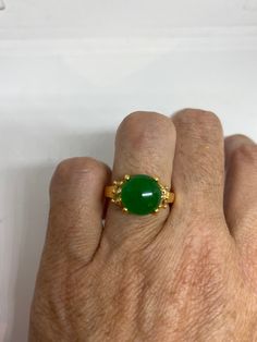 Vintage Lucky Green Nephrite Jade ring Fun jade is color enhanced Large green nephrite jade Ornate German Gold finished Vintage ring, does not tarnish, NOT sterling Size 6.5, 7 or 9 All rings are shipped free in the US in a nice gift box. Check out our over a THOUSAND great reviews Engraving is $4 per letter and is not always perfect depending on the piece. It can take a few days if the jeweler is busy. This is payable to Paypal Judithsltd@gmail.com Quartz Choker, Jade Color, Lucky Green, Nephrite Jade, Jade Ring, Natural Jade, Vintage Jewels, Vintage Ring, Rings Statement