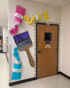 a door with some paintbrushes and other items on it