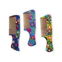 Experience the beautiful craftsmanship of Oaxacan artisans with our Hand-painted Wooden Mexican Comb! Made from durable Copal Wood and individually hand-painted, each comb is a one-of-a-kind piece of art. Enjoy the unique beauty and functionality of this comb as a part of your daily routine. Each one measures about 7.5" long x 2" wide. Wooden Comb Painting, Mexican Painted Wood Spoons With Holder, Oaxacan Wood Carvings, Piece Of Art, Unique Beauty, Daily Routine, Comb, New Color, Blue Color