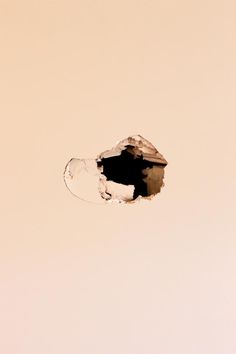 a hole in the ceiling that has been torn open