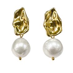 These Freshwater Pearl Dangle Earrings are an elegant choice for any occasion. Delight your senses with the timeless beauty of these simple yet sophisticated earrings, which can be matched with a complimentary necklace to create your own unique style. Enjoy the stunning craftsmanship and attention to detail of each handcrafted piece. Avoid contact with chemicals: Keep your pearl jewelry away from harsh chemicals such as perfumes, lotions, and hairsprays. Jewelry Magazine, September Birthstone Jewelry, Pearl Earrings Dangle, Men's Jewelry Rings, Earring Sale, Jewelry Ring Box, Modern Earrings, Pearl Jewellery Earrings, Eye Jewelry