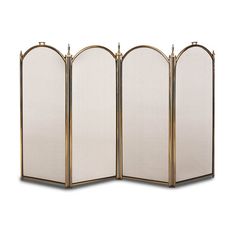 a four - paneled screen is shown in gold