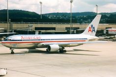 an american airlines plane is parked at the airport