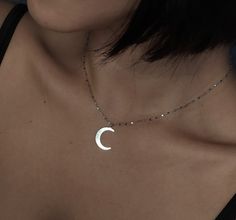 Nightside of Venus. This necklace is composed of solid sterling silver crescent moon charm, delicate diamond cut chain and components. A very sparkly gothic yet minimalistic piece with great detail. Makes a very impressive gift for moon lovers! Charm length: 0.8 inch // 2 cm You can choose between these chain lengths: 14 / 15 / 16 / 17 / 18 inches We add a 1 inch extender chain to all chokers for perfect fitting. ❈ We send all our items with registered mail. ❉ Due to the organic nature of stones, there might be a slight variation in colour, size and shape. ✺ All items come packaged in a quality velvet pouch ready for gift giving. ✽ If you want to make a special order, just contact us! Dainty Silver Moon Phase Necklace, Silver Half Moon Necklaces For Jewelry Making, Silver Half Moon Necklace For Jewelry Making, Silver Celestial Necklace With Delicate Chain, Celestial Silver Necklace With Delicate Chain, Silver Delicate Chain Celestial Necklace, Silver Crescent Minimalist Necklace, Minimalist Silver Necklace With Moon Charm, Minimalist Silver Half Moon Necklace