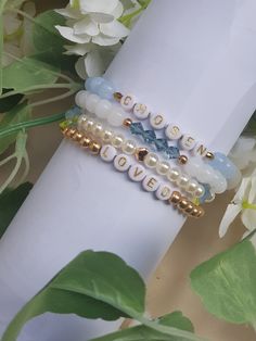 Step into a world of spirituality and style with our Beaded Bracelets with Christian Motivational Words. Handcrafted with love and dedication, these bracelets are more than just an accessory; they are a testament to your faith and a constant reminder of your personal journey. A perfect unique gift for her, each bracelet is personalized with a custom message of your choice, making it a truly one-of-a-kind piece that is sure to uplift and inspire. Made with high-quality beads, each bracelet is met Inspirational Beaded Bracelets As Gift, Inspirational Blue Bracelets For Gifts, Spiritual Stretch Bracelet With Tiny Beads As Gift, Inspirational Blue Beaded Bracelets For Gifts, Blue Inspirational Adjustable Beaded Bracelets, Inspirational Blue Adjustable Beaded Bracelets, Inspirational Beaded Round Bracelets, Inspirational Blue Bracelets For Friendship, Inspirational Blue Jewelry As A Gift