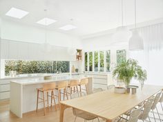 the kitchen is clean and ready to be used as a dining room or living room