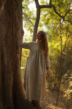 Natural dress from pure linen. It has a loose, maxi silhouette and can be used as maternity dress. SIZE S-M Length: 130 cm (51 inches) Hem: 180 cm (71 inches) Bust: 104 cm (41 inches) MATERIAL AND CARE Linen is the oldest known fabric. It is absorbent, breathable, and stronger than cotton. It is great at keeping you cool in the summer and is known for holding wrinkles. Linen gets better with use, becoming softer and silkier over time. It is also a more sustainable choice as growing flax plant re Bohemian Long Sleeve Dress In Natural Fiber, Peasant Style Linen Dress For Spring, Spring Linen Peasant Dress, Spring Peasant Linen Dress, Peasant Linen Tunic Dress, Peasant Style Long Sleeve Linen Dress, Peasant Linen Dress With Long Sleeves, Long Sleeve Peasant Linen Dress, Bohemian Beige Long Sleeve Linen Dress