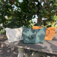 "Dive into the elegance of simplicity with our handcrafted Small Linen Handbag. Perfectly tailored for daily outings, it's a blend of practicality and fashion-forward design. ✅ Primary Color: Deep Blue Green  | Camel Mustard | Natural Beige Features: 🍃 Superior Quality Material: * Made from 100% pure heavyweight linen, guaranteeing lasting durability coupled with a delicate feel. * Weight: 280 g/m² (8.26 oz/yd²) * Inner Lining Weight: 205 g/m² (6.05 oz/yd²) 🍃 Safety Certified: Rest easy knowing our bags are OEKO-TEX® Standard 100 certified. Your assurance that they are both safe and free from harmful chemicals. 🍃 Smart & Stylish Design: * An extra layer of linen lining boosts its robustness. * An internal pocket ensures that your essentials remain within reach. * The softened texture of Linen Handbags, Turtle Conservation, Bag With Pockets, Style Français, Winter Quilts, Everyday Tote, Linen Bag, French Linen, Casual Everyday