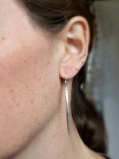 "These sterling silver earrings are a perfect match for any necklace, and are great for every day wear! An ultra shiny sterling silver spike hangs from sterling silver leverback or french hook earwires. The total length of the shorter style is aprox 1.5\" Longer spikes are also available and are 2.25\" Matching necklace is available here: https://www.etsy.com/listing/513643068/sterling-silver-necklace-small-spike?ref=shop_home_active_38 These earrings will arrive in a small zip lock bag, as well Silver Linear Earrings With French Hook Gift, Silver Dainty Earrings With French Hook, Classic Silver Linear Earrings For Everyday, Everyday Sterling Silver Long Drop Earrings, Everyday Long Drop French Hook Jewelry, Sterling Silver Drop Earrings With Lever Back, Everyday Dangle Linear Earrings With French Hook, Sterling Silver Drop Linear Earrings With Lever Back, Silver French Hook Earrings For Everyday