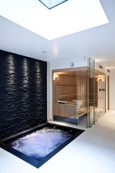 an indoor hot tub in the middle of a room