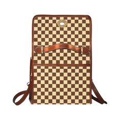 • Elevate your style with our Brown Checker Handbag, a chic accessory featuring a retro-inspired checker pattern.• Designed in a Mod 60s purse style, this Retro Handbag adds a vintage flair to any outfit, perfect for those who appreciate timeless fashion.• Crafted from high-grade tarpaulin, this Checker Bag offers both durability and style, making it a practical yet fashionable choice.•The brown and beige white checker pattern print gives this Brown Checker Satchel Handbag a modern retro feel, adding a touch of sophistication to your look.Designed in California by Trendy Hip Buys. Handmade to order from overseas.Material: high-grade tarpaulinDimensions: 10.8"(L) x 4.13"(W) x 7.87"(H),Two internal pockets for small items, one zipper pocket; Removable and adjustable shoulder straps. Retro Bags With Detachable Handle In Vintage Brown, Retro Brown Shoulder Bag For On-the-go, Checkered Purse Crochet, Checkered Pattern Design, Checkered Shoulder Bag Crochet, 60s Purse, Brown Checkered, Purse Style, Vintage Inspired Shoes