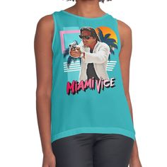 Women's sleeveless tank with vivid edge-to-edge sublimation print on front. Spliced materials for comfort. Front panel made from silky chiffon and solid color black or white jersey back. Sizes available XS- 2XL. Retro Miami Vice 80s Sonny Crockett Tribute Retro Graphic Print Sleeveless Tank Top, Fitted Sleeveless Vest With Graphic Print, Retro Sleeveless Summer Tank Top, Summer Sublimation Print Sleeveless Tank Top, Sleeveless Sublimation Print Tank Top For Summer, Sleeveless Tops With Sublimation Print For Summer, Summer Sleeveless Tank Top With Sublimation Print, Retro Fitted Sleeveless Tank Top, Fitted Retro Sleeveless Tank Top