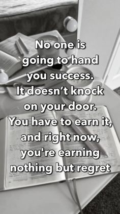 a pile of books sitting on top of a floor next to a door with the words, no one is going to hand you success it doesn't knock on your door