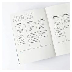 an open planner with the words future log written in black and white on top of it