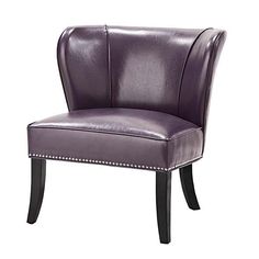 a purple leather chair with studded legs