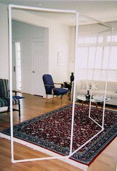 a living room filled with furniture and a rug