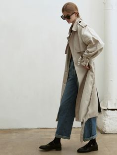 Editor's notesWhether the elements with this double-breasted trench featuring our iconic turn-lock hardware for a heritage touch. Crafted in a sturdy poly blend, the transitional, belted silhouette is finished belting at the sleeves.- Oversized collar- Front and back panel- Double-breasted button closure- Deep back vent- Maxi long trench coat- Angled side pocketsMeasurements(in.)- Size: One size(XS-M)- Chest: 23.62in- Sleeve: 27.56in- Length: 45.28in- Model Info: 5' 7 / BUst 32.28in / Waist 23.6 Classic Long Coat With Belt, Classic Fall Outerwear With Belt, Classic Belted Outerwear For Fall, Beige Belted Outerwear For Office, Classic Double-breasted Belted Outerwear, Belted Khaki Outerwear For Business, Classic Beige Outerwear With Belt Loops, Beige Outerwear With Belt Detail For Fall, Modern Belted Outerwear For Work