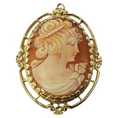 14 Karat Yellow Gold Cameo Brooch/Pendant- This elegant cameo features a lovely lady in profile set in beautifully detailed 14K yellow gold. Can be worn as a brooch or a pendant. Size: 49 mm x 36 mm Weight: 7.1 dwt. / 11.1 gr. Stamped: 14K Very good condition, professionally polished. Will come packaged in a gift box or pouch (when possible) and will be shipped U.S. Priority Mail Insured. DV051622/17KCS Brooch Diamond, Cameo Jewelry, Vintage Cameo, Antique Brooches, Carved Shell, Pin Pendant, Cameo Brooch, Cameo Pendant, Filigree Design