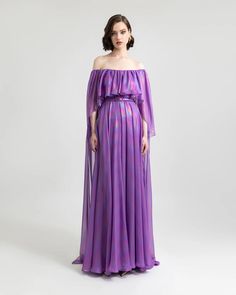 Step into the spotlight with our off-shoulder flared-cut purple evening dress, adorned with captivating ruffled details. Embrace elegance and grace in this striking ensemble. Old Hollywood Dresses, Purple Evening Dress, Chiffon Dress Long, Unique Prom Dresses, Cut Dress, Pleated Bodice, Cape Dress, Dress Cuts, Old Hollywood