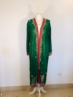 "A Beautiful Long Boho Hippie Chic Kimono Jacket. Sequinned and Embroidered ; Perfect for Holidays,Parties,Weddings and Celebrations as a Cover Up. Handmade in India from a Vintage Sari ,so completely unique and sustainable. The Fabric is a Gorgeous and Flattering Emerald Green Silky Chiffon ,with a contrasting Fuschia Pink border. The Exquisite embellishment features a Vibrant Paisley Design in Glittering Gold and Purple Sequins, Pearly Beads and Diamante Crystals. The size will fit and flatter Festive Long Sleeve Kaftan With Zari Work, Bohemian Long Sleeve Cardigan For Party, Long Sleeve Sequin Outerwear For Wedding, Bollywood Long Sleeve Kaftan With Zari Work, Embellished Long Sleeve Kaftan For Festive Occasions, Long Sleeve Embellished Kaftan For Festive Occasions, Traditional Embellished Festive Outerwear, Festive Hand Embellished Long Sleeve Outerwear, Traditional Long Sleeve Outerwear For Party