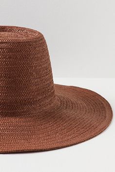 Stay away from the rays in this oversized straw hat, featuring a large, floppy brim perfect for all-day lounging by the pool or beach. * Lightweight * Packable, unstructured design | Shady Character Packable Wide Brim Hat by Free People in Brown Lightweight Flat Brim Straw Hat For Sunbathing, Chic Flat Brim Sun Hat For The Beach, Chic Flat Brim Sun Hat For Beach, Casual Toquilla Straw Sun Hat For Sunbathing, Flat Brim Straw Hat For Vacation Sunbathing, Flat Brim Straw Hat For Sunbathing On Vacation, Vacation Straw Hat With Flat Brim For Sunbathing, Unlined Beach Hats For Spring, Spring Beach Hat Unlined