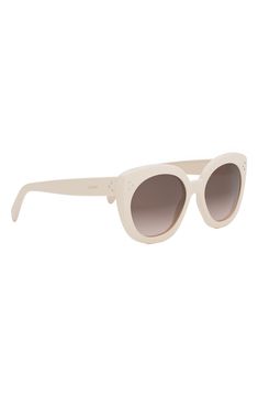 Sleek, vintage-inspired frames add glamorous style to these eye-catching Italian-made sunglasses highlighted with polished branding at the temples. 56mm lens width; 20mm bridge width; 145mm temple length 100% UV protection Acetate Made in Italy White Round Frame Sunglasses With Gradient Lenses, Luxury Beige Sunglasses With Gradient Lenses, Elegant Cream Sunglasses With Tinted Lenses, Modern White Round Frame Sunglasses, Chic Cream Cat Eye Sunglasses, Modern Cream Sunglasses With Uv Protection, Cream Square Frame Sunglasses With Tinted Lenses, Modern Cream Sunglasses With Polarized Lenses, Modern Cream Sunglasses With Tinted Lenses